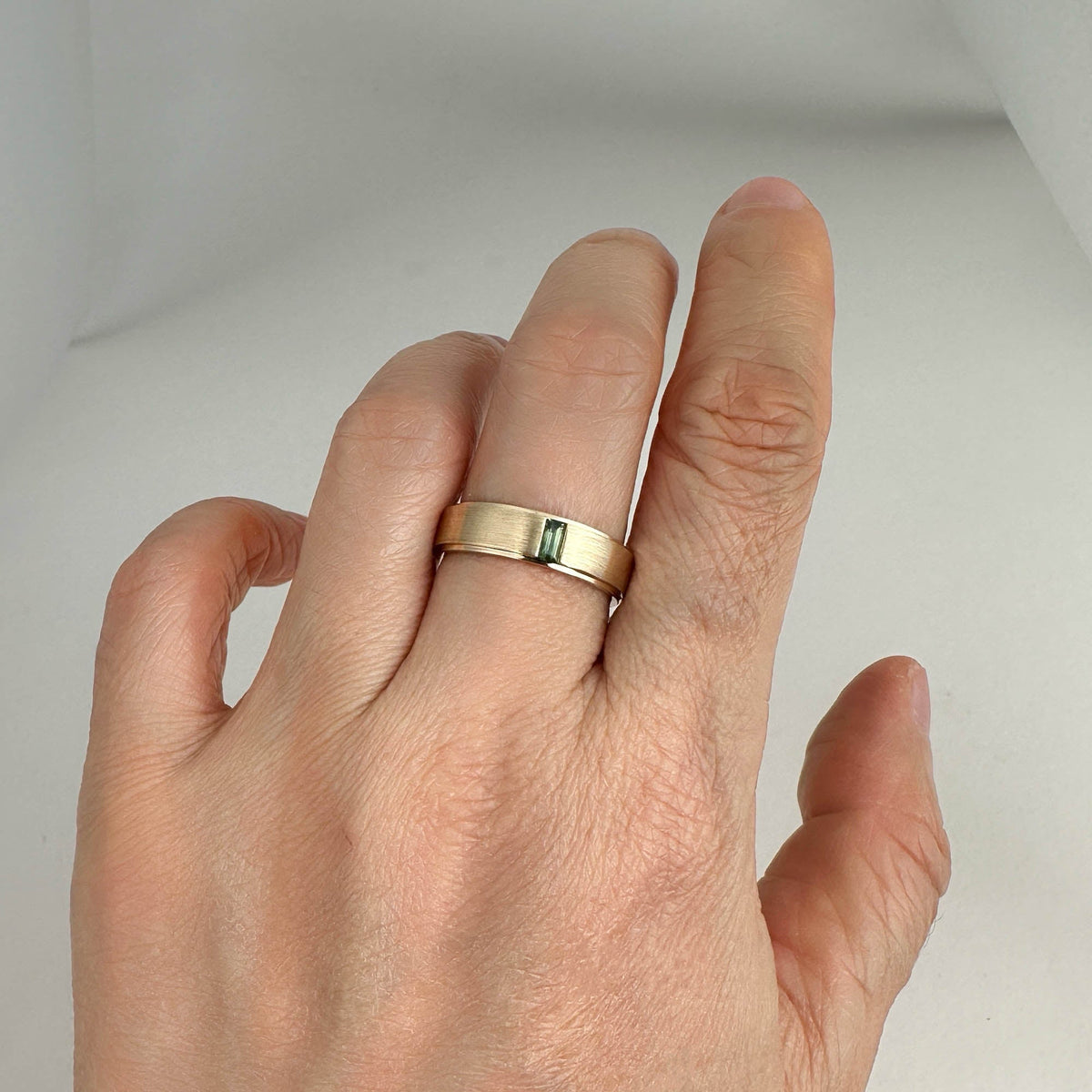 14K Gold 5mm Wide Wedding Band with Baguette Teal Sapphire M5097 Aurora Designer