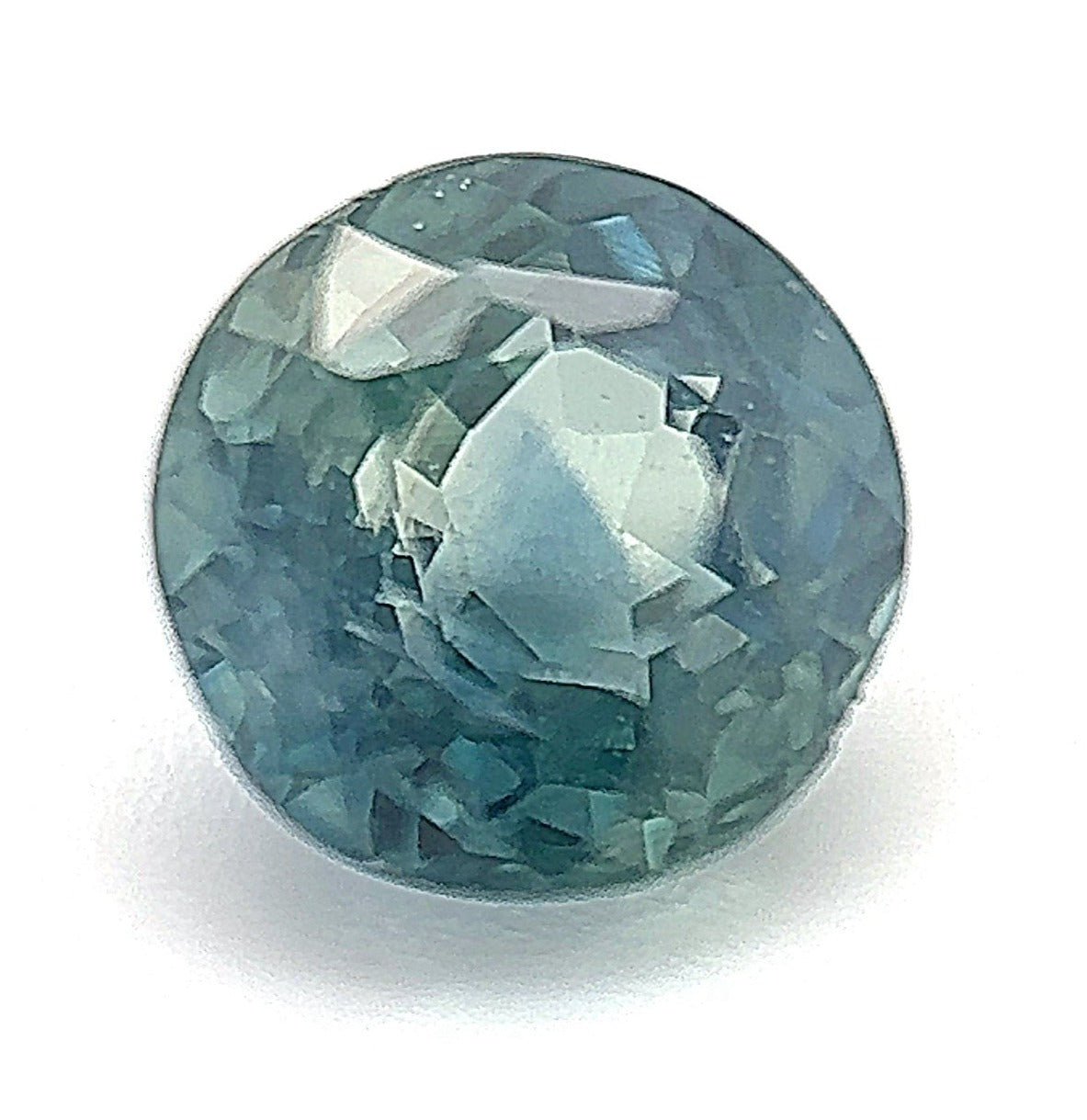 1.35ct Round Shape Montana Sapphire 5.7*4.3mm PS454 Aurora Designer