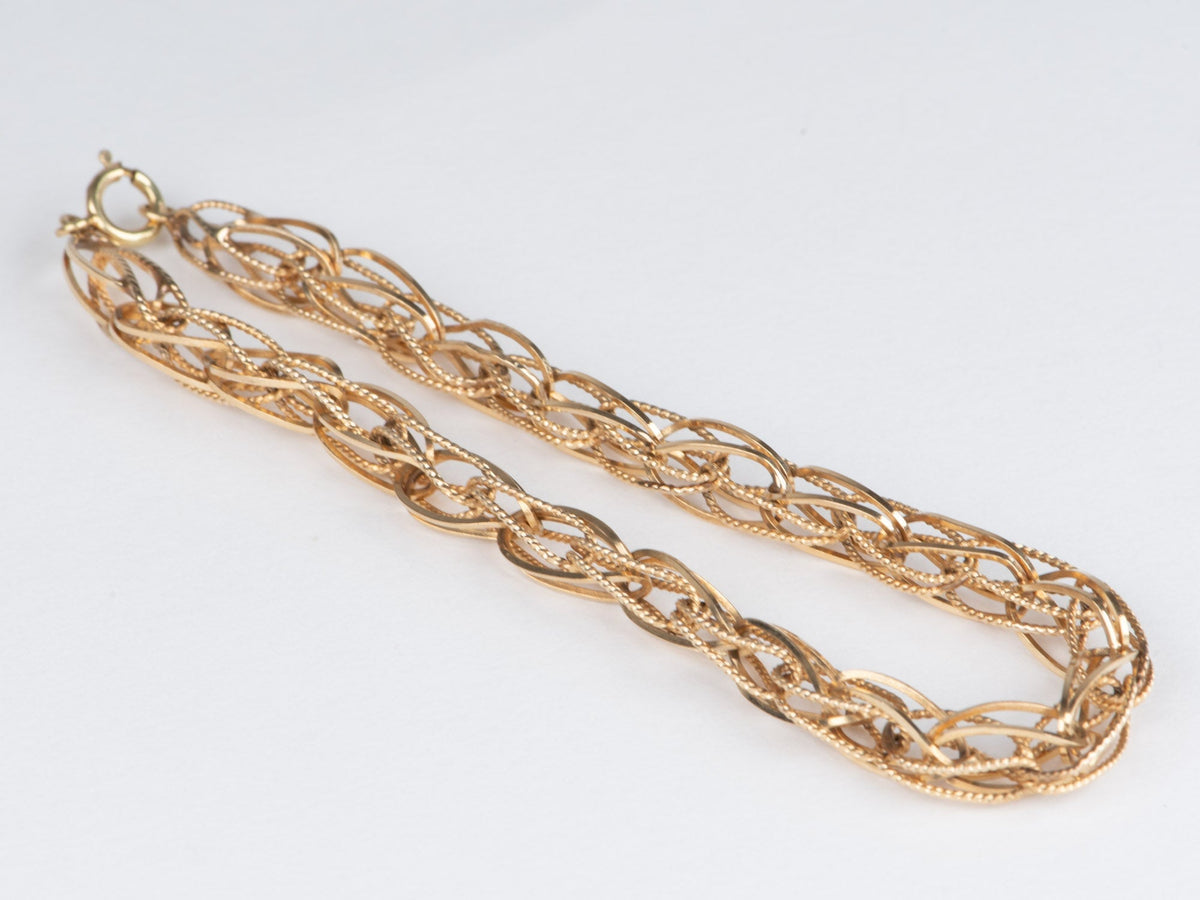 14K Gold Intertwined Braided Link Bracelet 6.68g R2066 Aurora Designer
