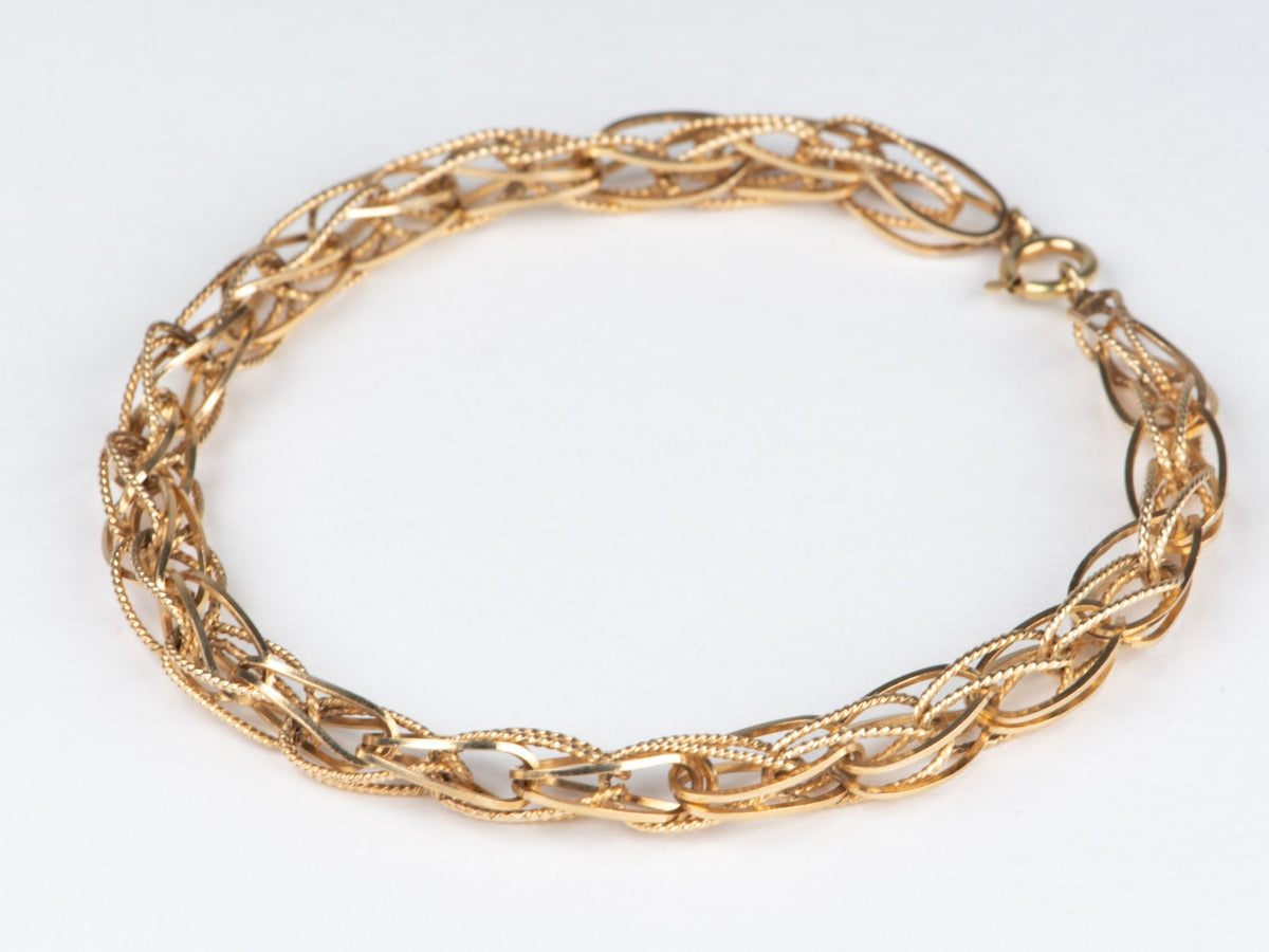 14K Gold Intertwined Braided Link Bracelet 6.68g R2066 Aurora Designer
