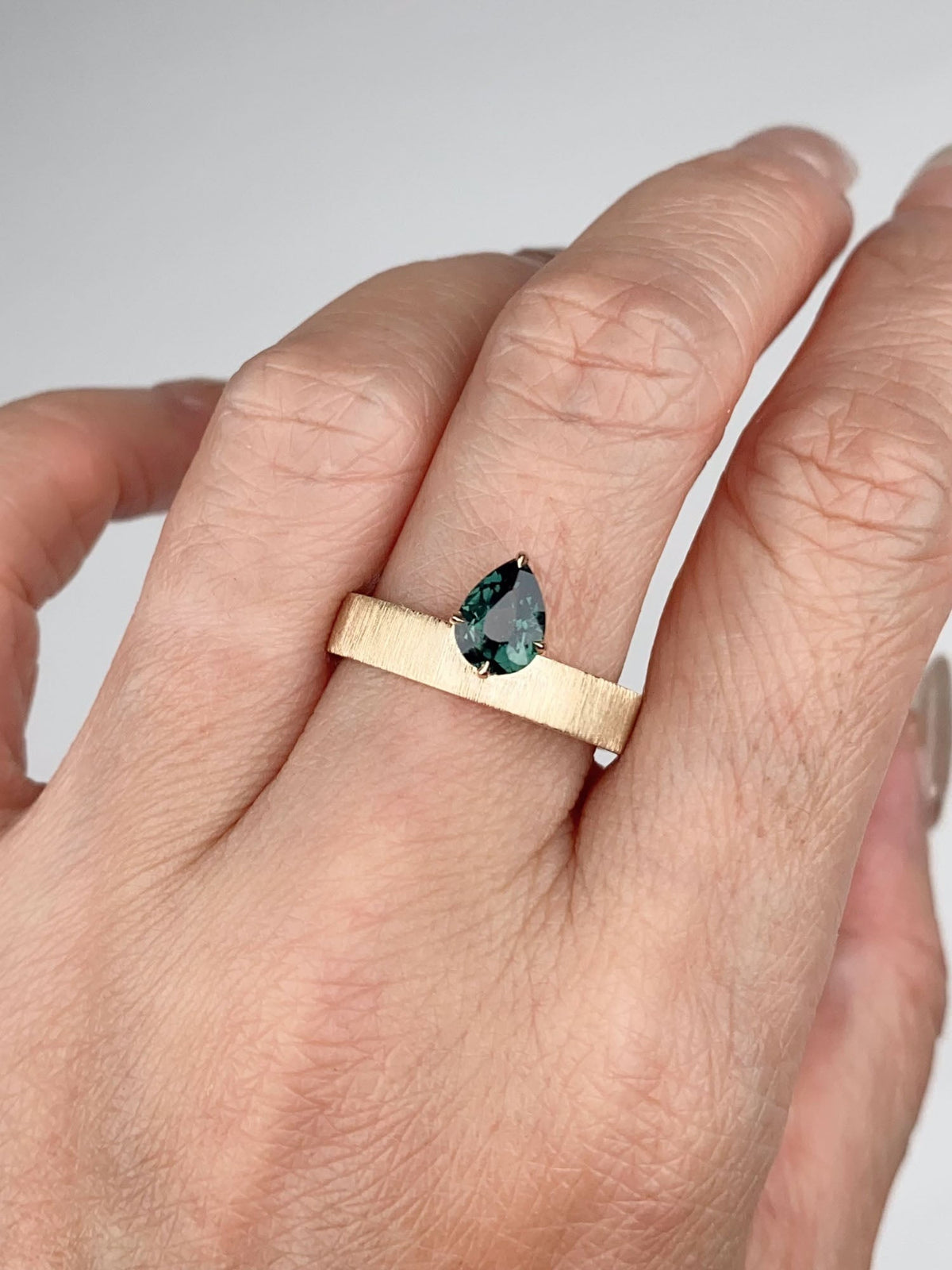 Teal Sapphire on Wide Band 14K Gold Engagement Ring Hand Brushed Finish R6785 Aurora Designer