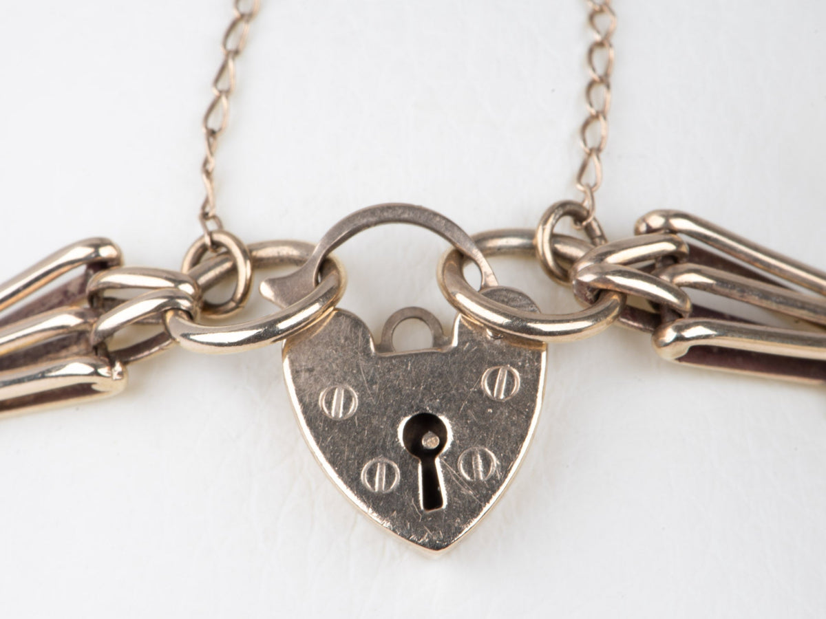 9K Gold Vintage Gate Link Bracelet with Padlock Heart Clasp 7" Has Safety Link Heavy 15g+ Assayed 375 V1067 Aurora Designer