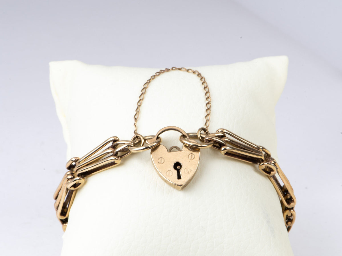 9K Gold Vintage Gate Link Bracelet with Padlock Heart Clasp 7" Has Safety Link Heavy 15g+ Assayed 375 V1067 Aurora Designer