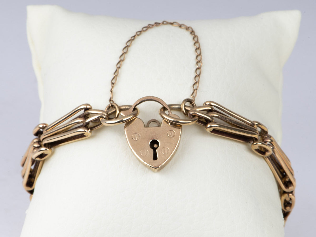 9K Gold Vintage Gate Link Bracelet with Padlock Heart Clasp 7" Has Safety Link Heavy 15g+ Assayed 375 V1067 Aurora Designer