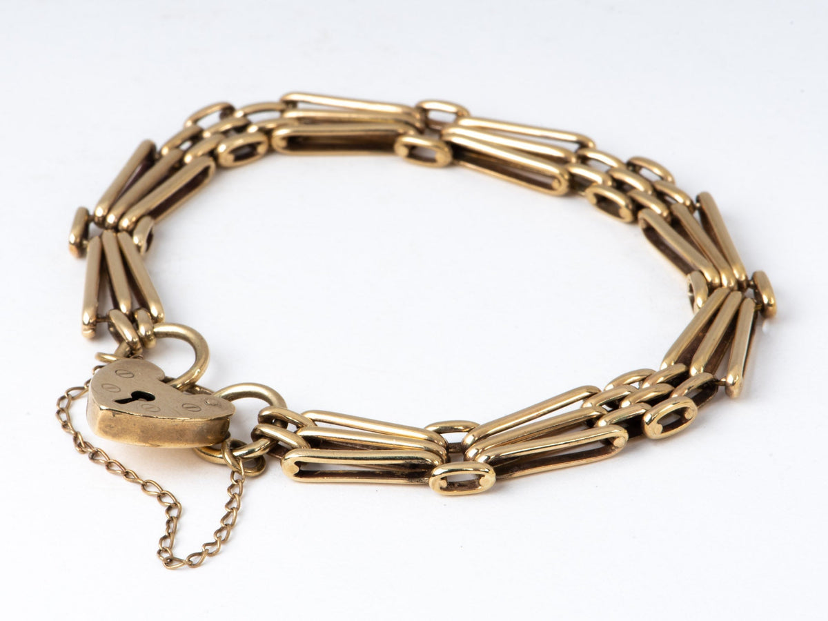 9K Gold Vintage Gate Link Bracelet with Padlock Heart Clasp 7" Has Safety Link Heavy 15g+ Assayed 375 V1067 Aurora Designer
