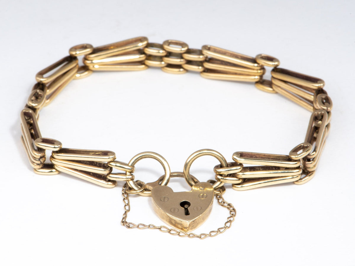 9K Gold Vintage Gate Link Bracelet with Padlock Heart Clasp 7" Has Safety Link Heavy 15g+ Assayed 375 V1067 Aurora Designer