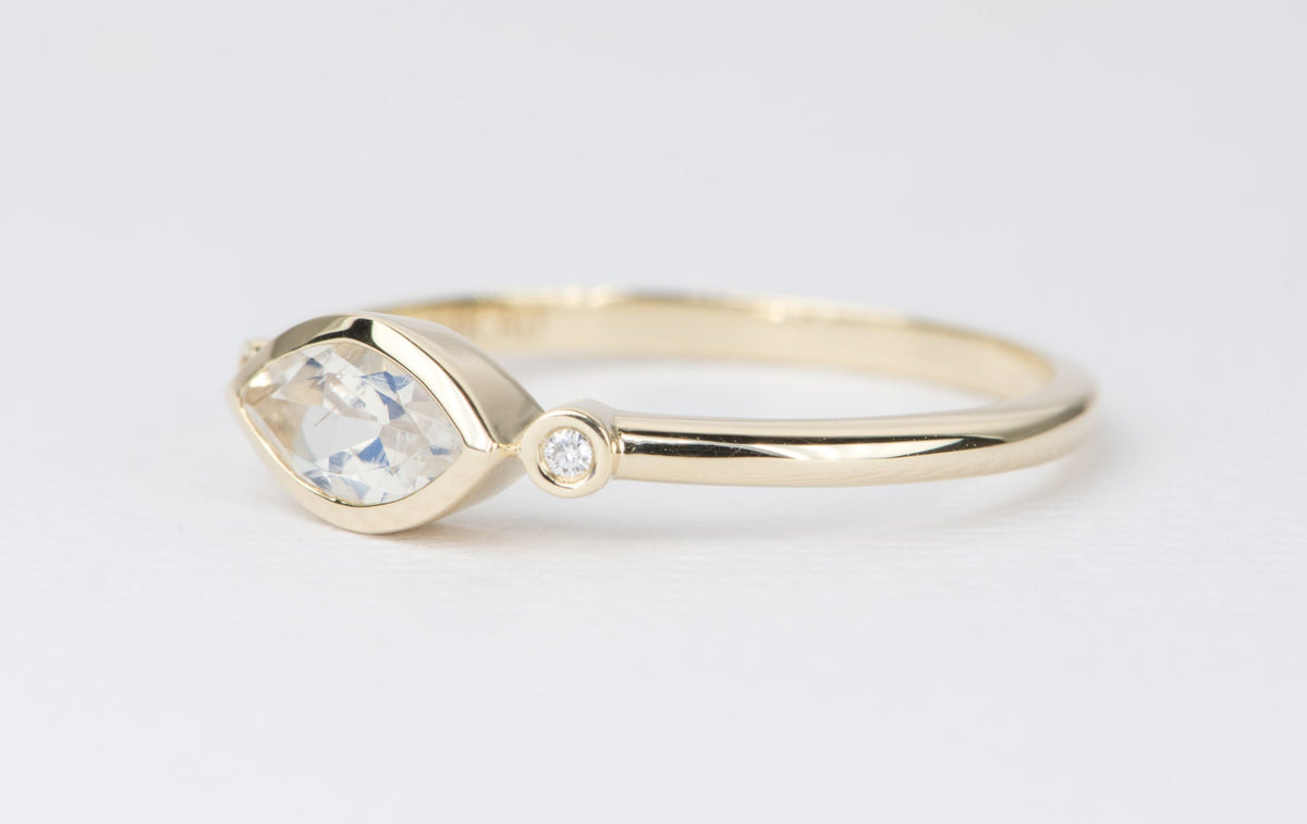 East-West Bezel Set Marquise Rainbow Moonstone with Diamonds 14K Engagement Ring AD1234 Aurora Designer
