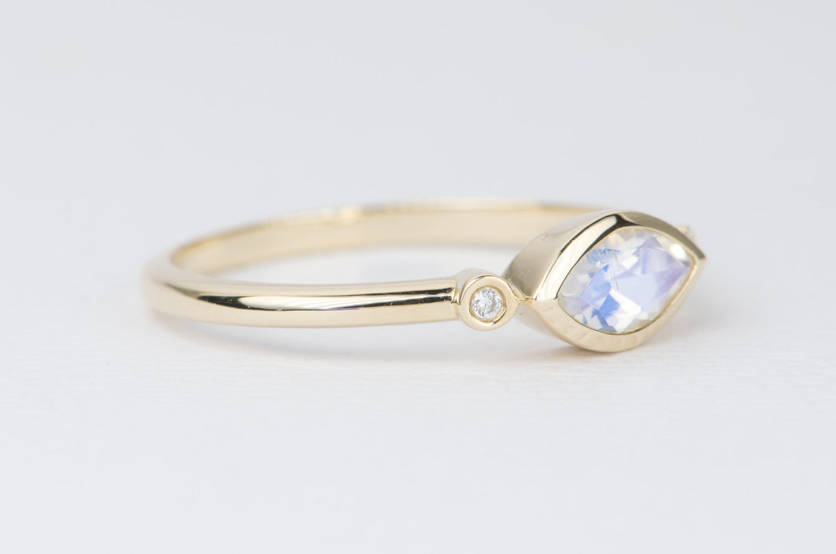 East-West Bezel Set Marquise Rainbow Moonstone with Diamonds 14K Engagement Ring AD1234 Aurora Designer