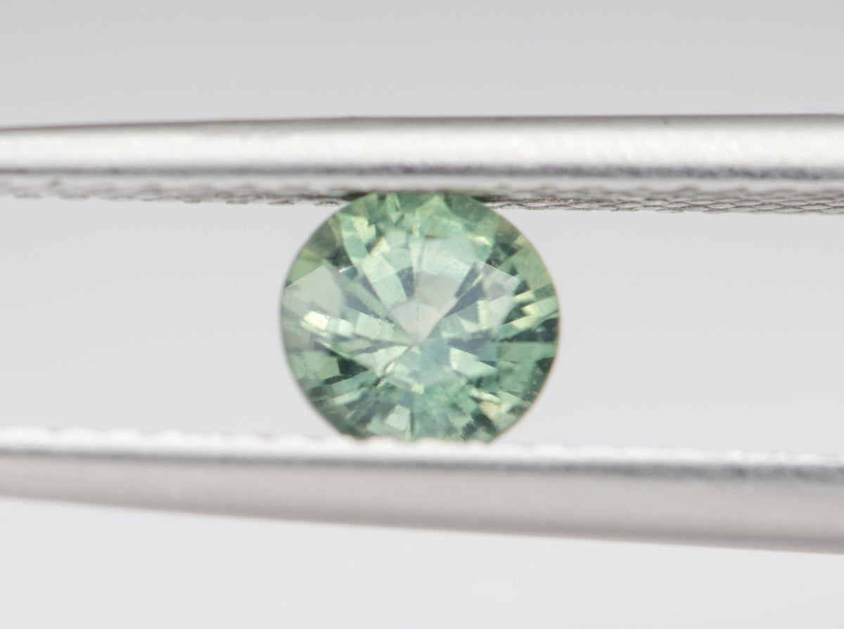 0.67ct Round Shape Montana Sapphire 5.1*3.3mm PS538 Aurora Designer