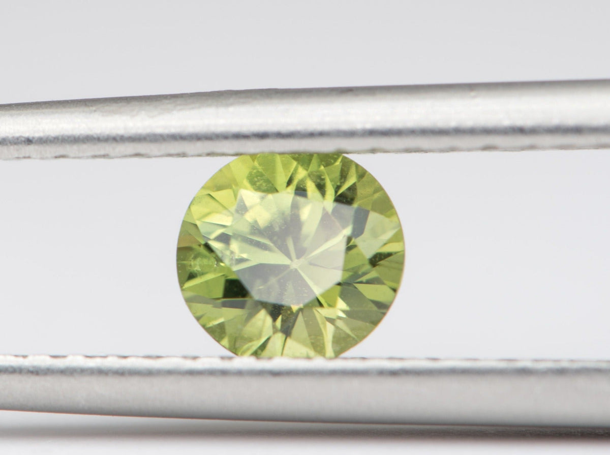 0.62ct Round Shape Montana Sapphire 5.2*3.3mm PS541 Aurora Designer