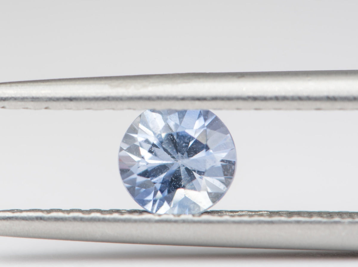 0.6ct Round Shape Montana Sapphire 5.0*3.4mm PS544 Aurora Designer
